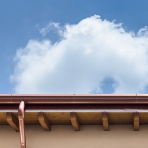 Plumbing consisting of copper gutter and drain.